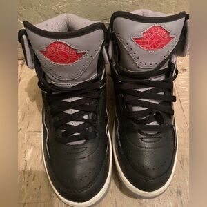 Air Jordan Black and Gray Sneakers with Red Logo